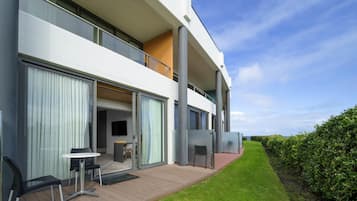 Minibar, desk, laptop workspace, iron/ironing board