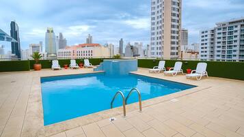 Outdoor pool, pool umbrellas, sun loungers