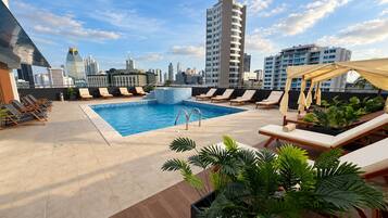 Outdoor pool, pool umbrellas, sun loungers