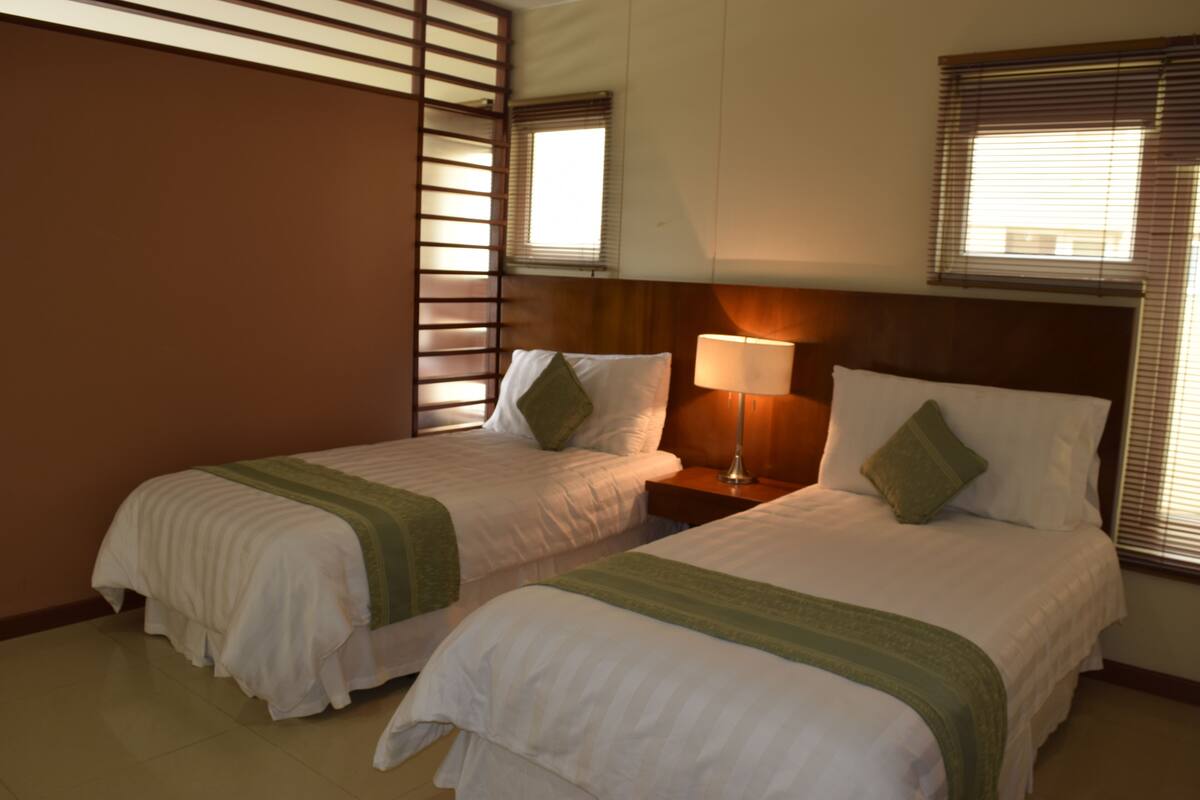 Golden Room | Premium bedding, in-room safe, desk, blackout curtains