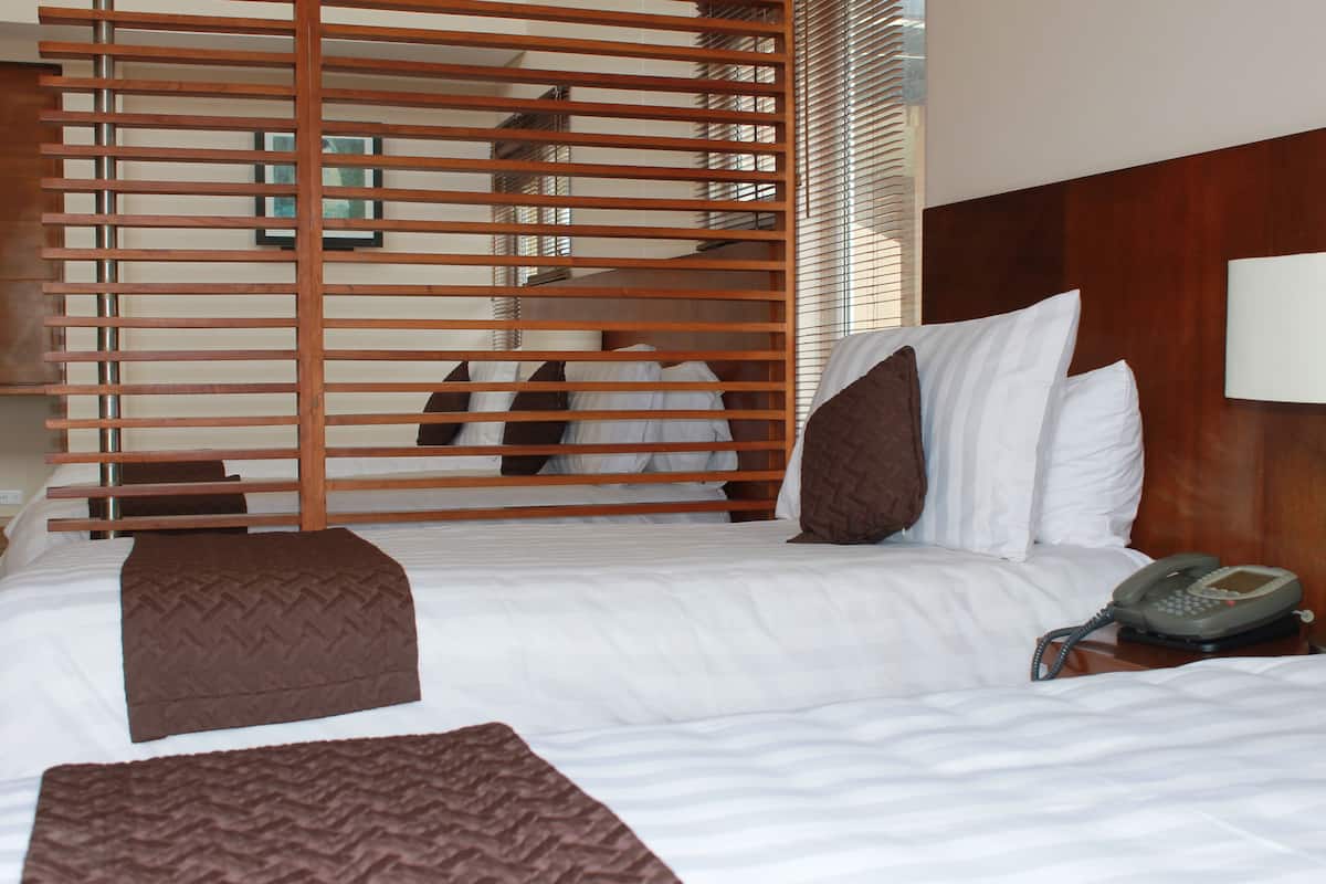 Platinum Room | Premium bedding, in-room safe, desk, blackout curtains