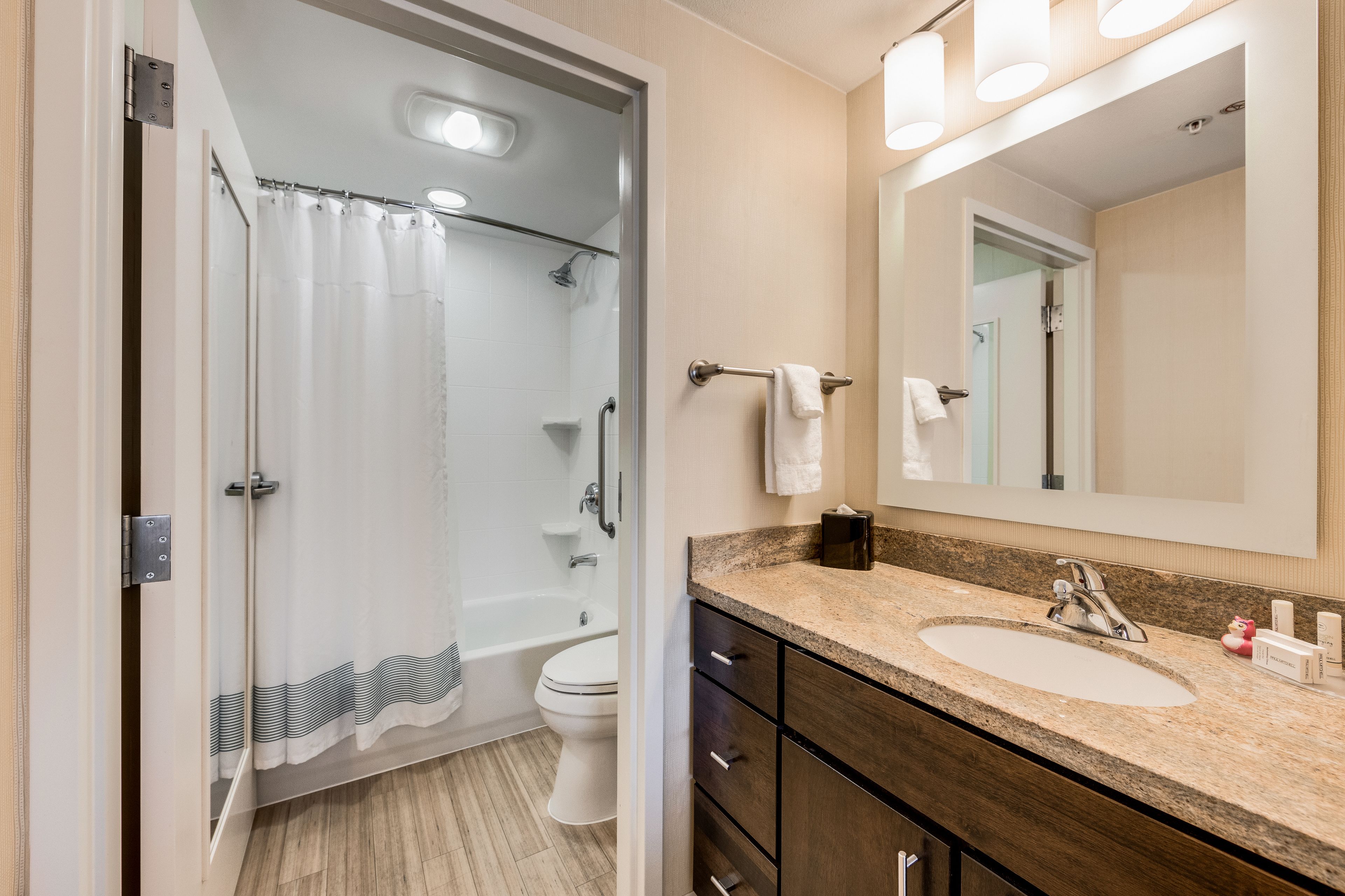 studio suite, 2 queen beds | bathroom | combined shower/bathtub, hair dryer, towels