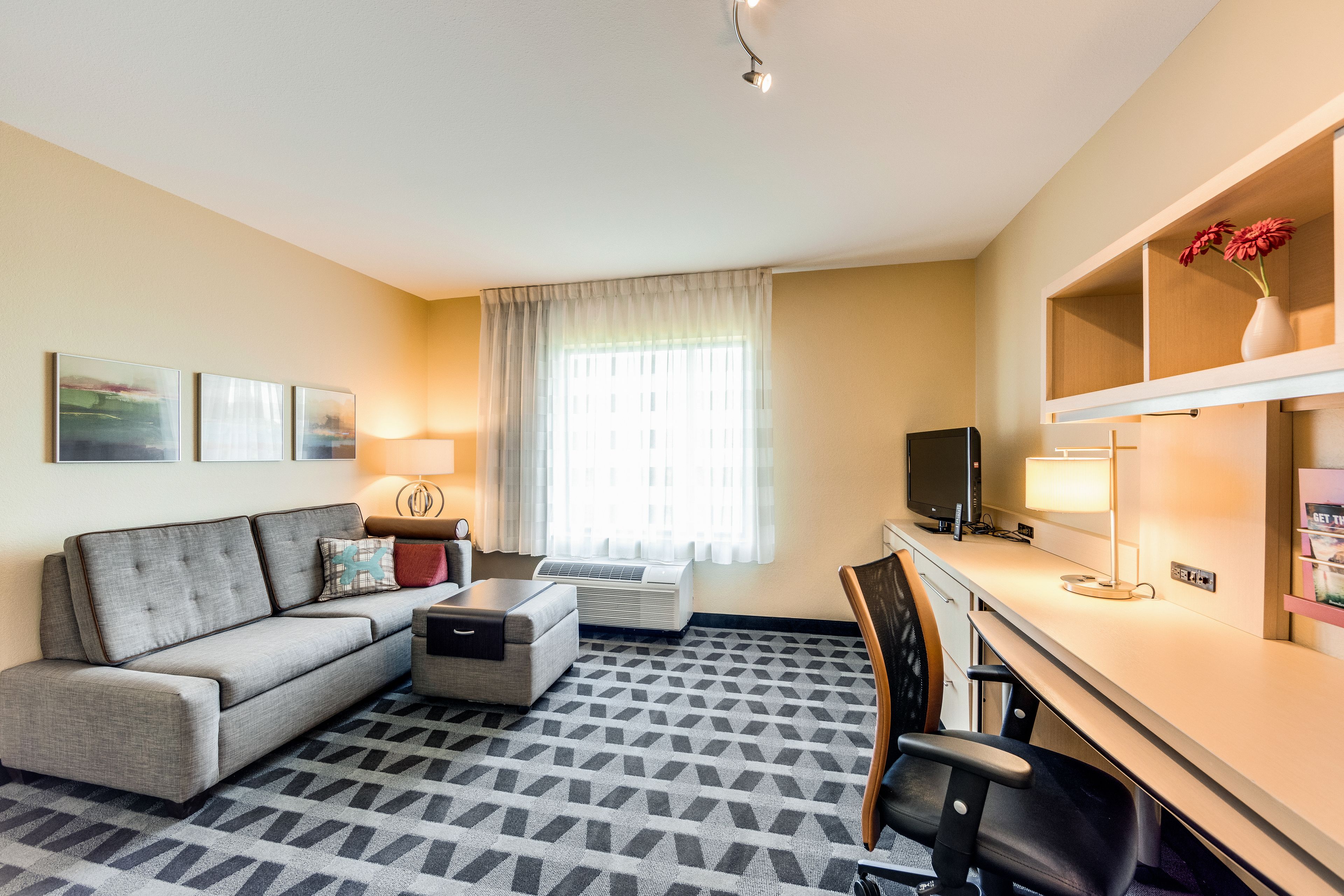 Suite, 1 Bedroom | Living area | 32-inch LCD TV with cable channels, TV