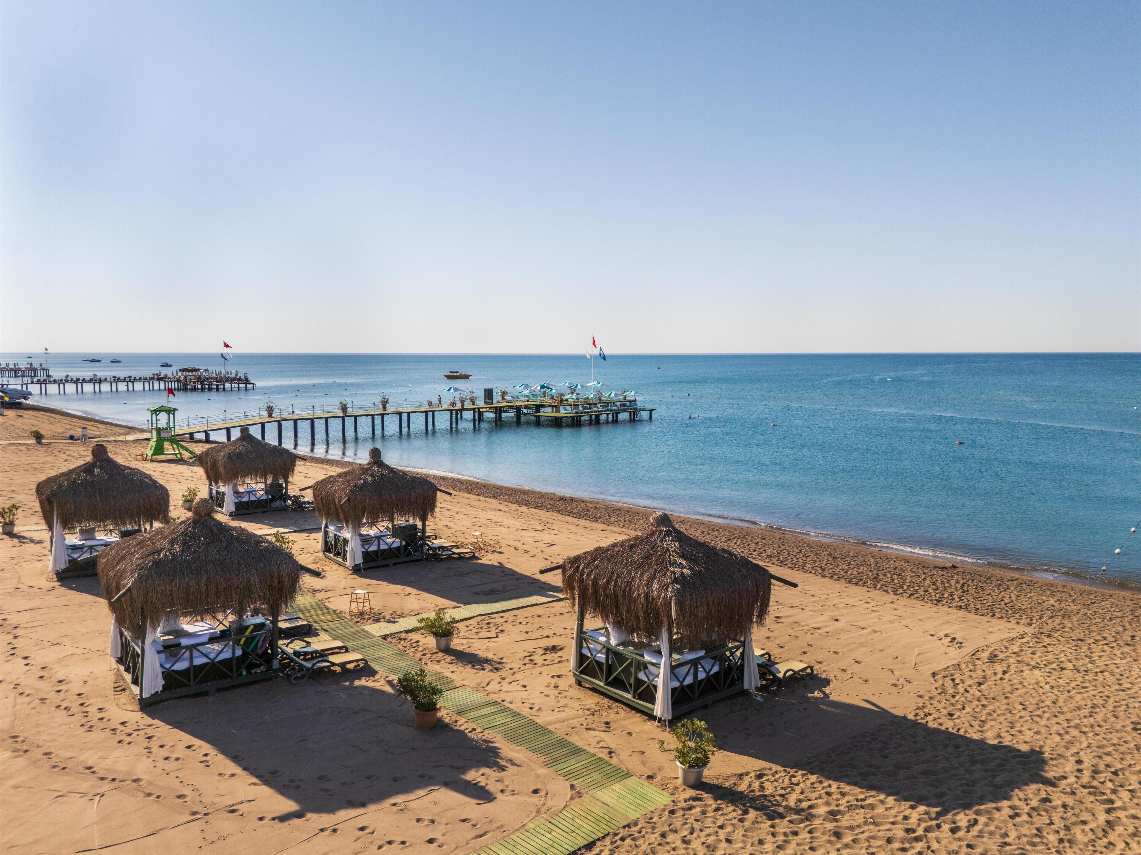 Private beach, free beach shuttle, beach cabanas, sun loungers