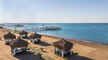 Private beach, free beach shuttle, beach cabanas, sun loungers