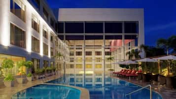 Outdoor pool, open 6:30 AM to 6:00 PM, pool umbrellas, pool loungers