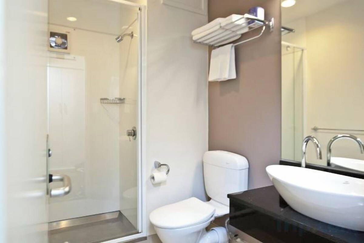 Bathroom | Shower, hair dryer, towels