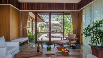 Rooftop Villa, 1 Bedroom, Garden View | Minibar, in-room safe, desk, laptop workspace