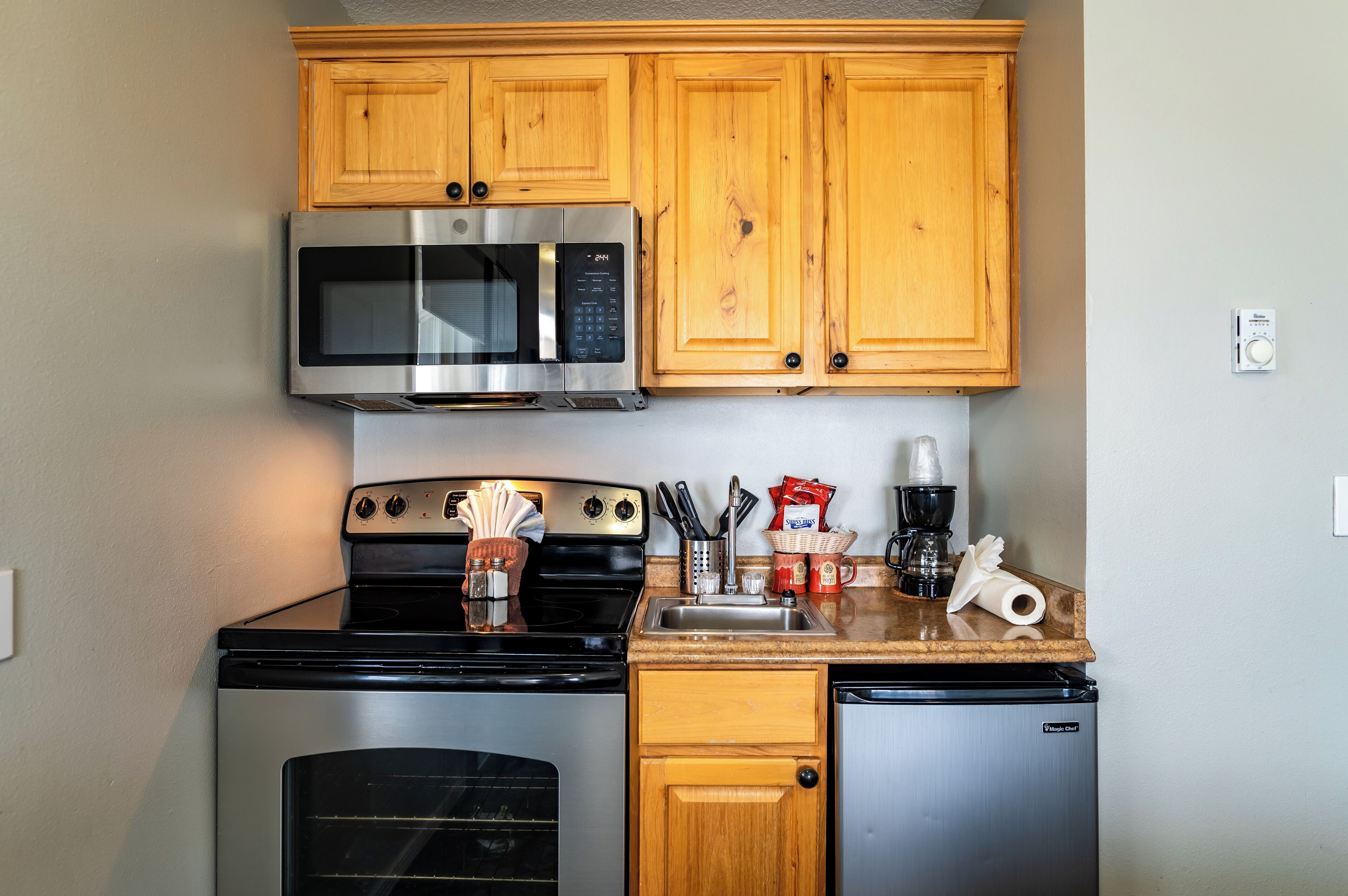 suite, oceanfront king with sofa bed & spa | private kitchen | mini-fridge, microwave, coffee/tea maker, cookware/dishes/utensils