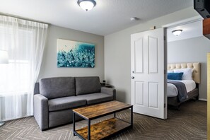 One Bedroom Suite with Spa Non-View | Living area | 32-inch flat-screen TV with cable channels, TV, fireplace - Inn at the Prom Oceanfront Seaside (Seaside)