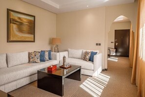 Executive Suite | Living area | 32-inch plasma TV with satellite channels, TV