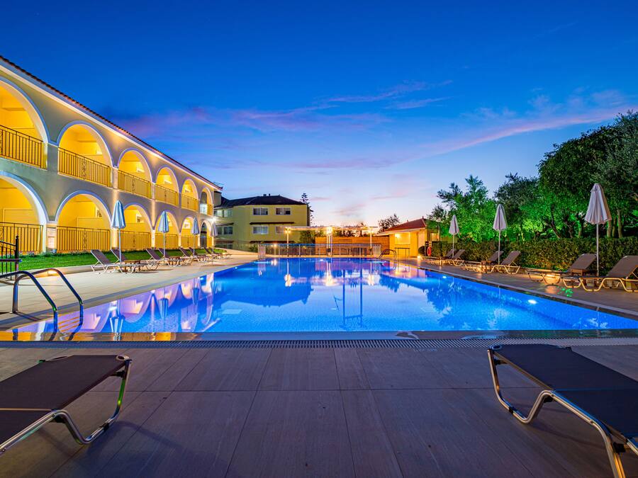 Seasonal outdoor pool, open 9:00 AM to 9:00 PM, pool umbrellas