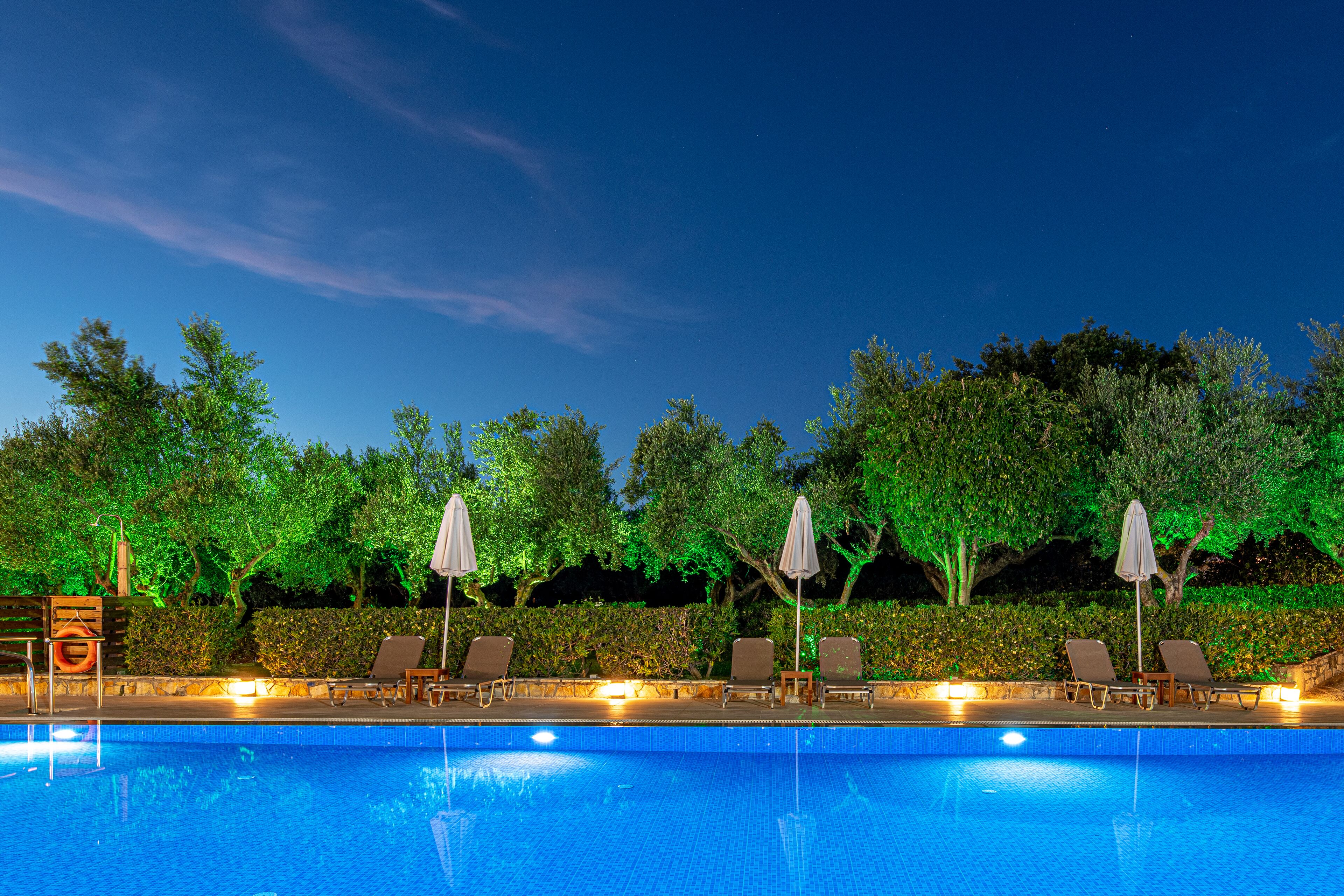 seasonal outdoor pool, open 9:00 am to 9:00 pm, pool umbrellas