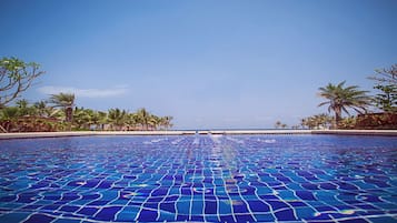 Outdoor pool, pool umbrellas, sun loungers