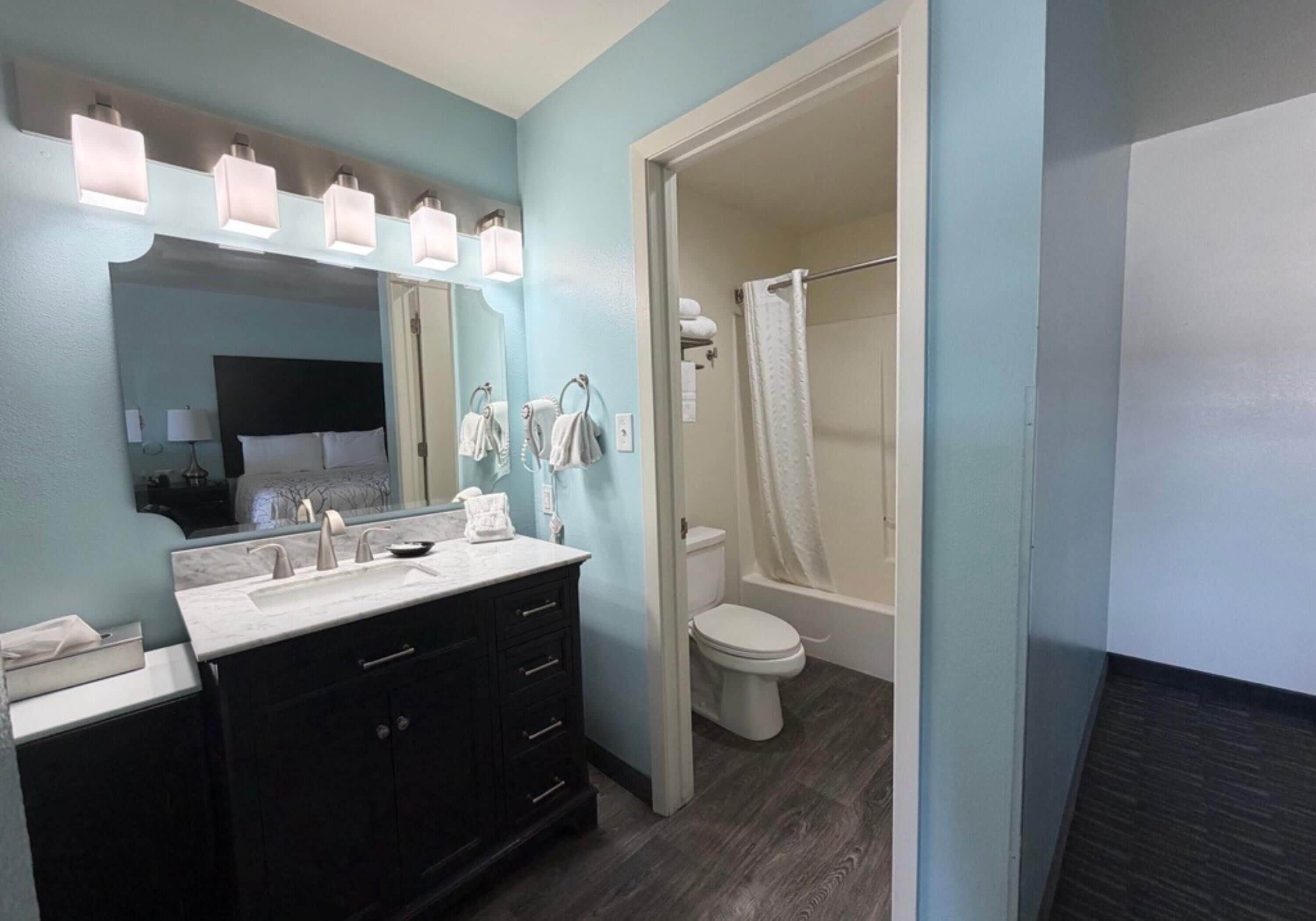 Standard Room, 2 Queen Beds, Non Smoking, Refrigerator & Microwave | Bathroom | Combined shower/tub, free toiletries, towels