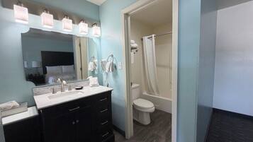 Standard Room, 2 Queen Beds, Non Smoking, Refrigerator & Microwave | Bathroom | Combined shower/tub, free toiletries, towels