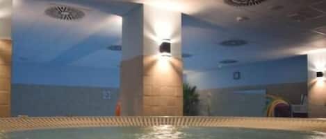 Indoor pool, open 6:00 PM to 9:00 PM, sun loungers, lifeguards on site