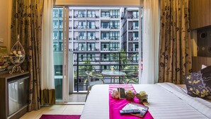 Habitación superior, 1 cama King size | Ropa de cama de alta calidad y minibar 
