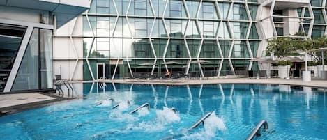 Outdoor pool, pool umbrellas, sun loungers