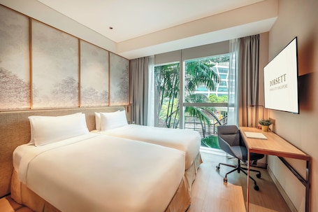 Superior Room | Minibar, in-room safe, desk, laptop workspace. Dorsett Changi City Singapore