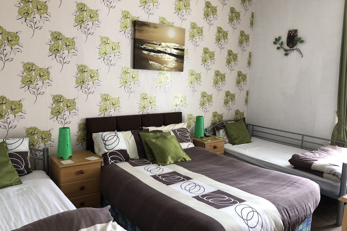 family room, shared bathroom (room 4) | iron/ironing board, free wifi, bed sheets