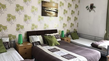 Family Room, Shared Bathroom (Room 4) | Iron/ironing board, free WiFi, bed sheets