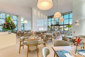 Lunch, dinner served; international cuisine, beach views