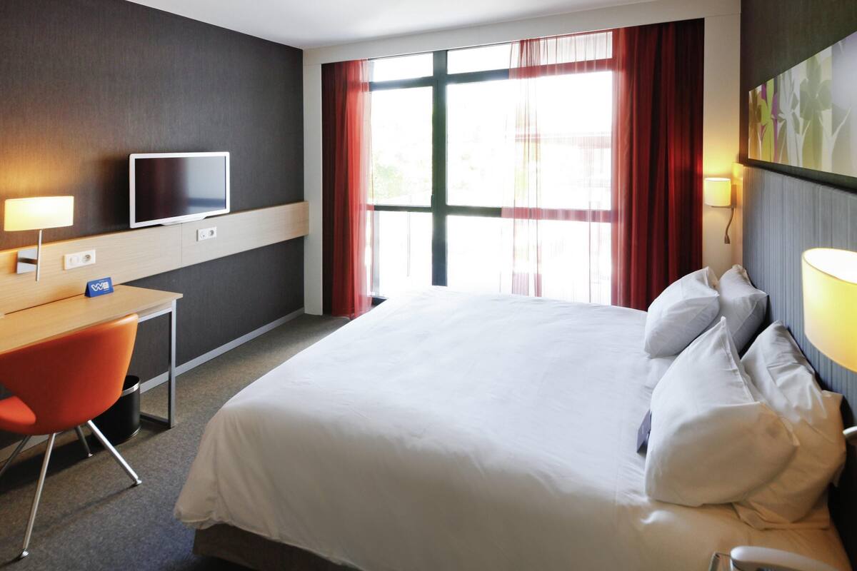 Literie de qualité supérieure, surmatelas, minibar