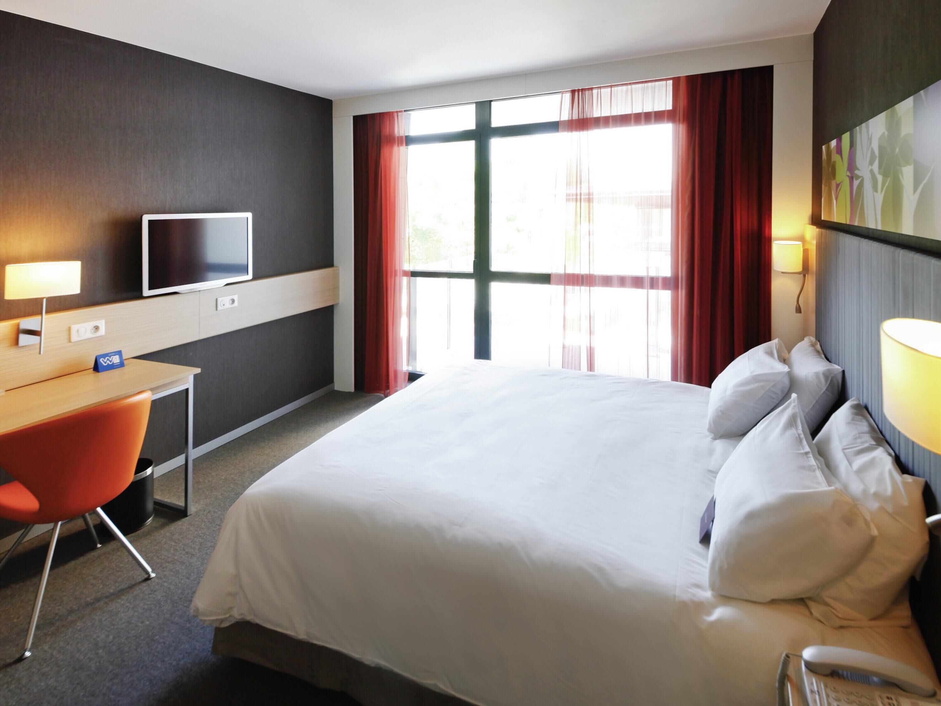 Premium bedding, pillow-top beds, minibar, in-room safe
