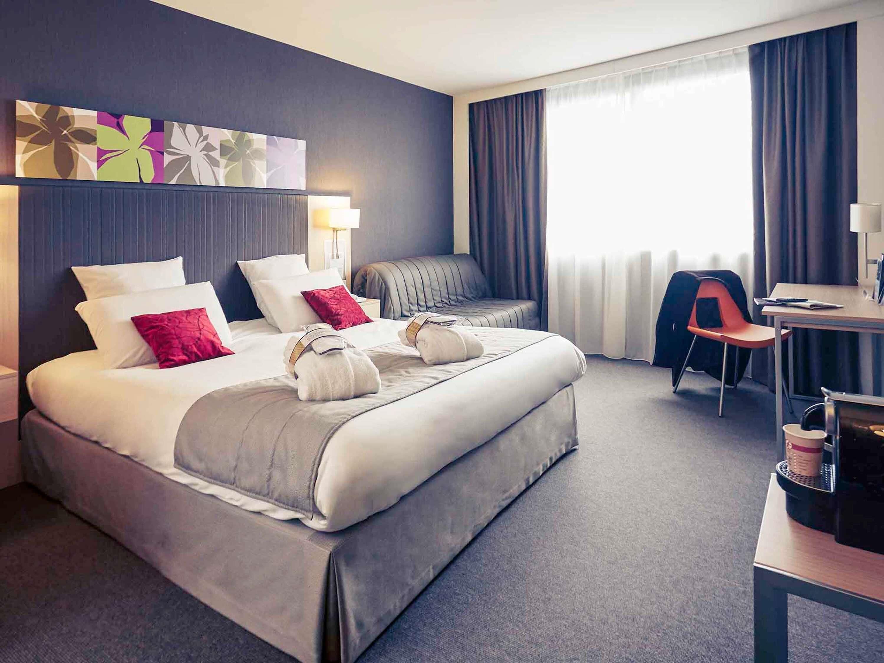Ropa de cama de alta calidad, colchones con pillow-top y minibar 