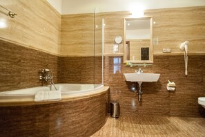 Designer toiletries, hair dryer, bidet, towels