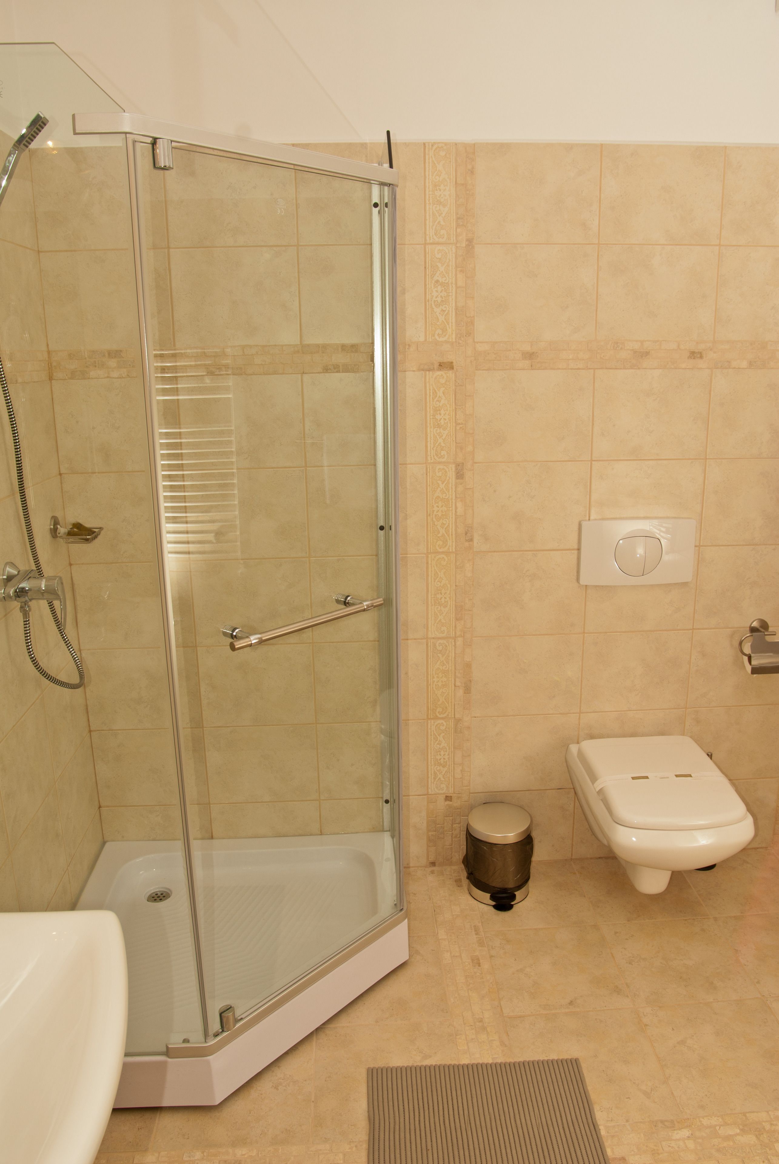 shower, hair dryer, bathrobes, slippers