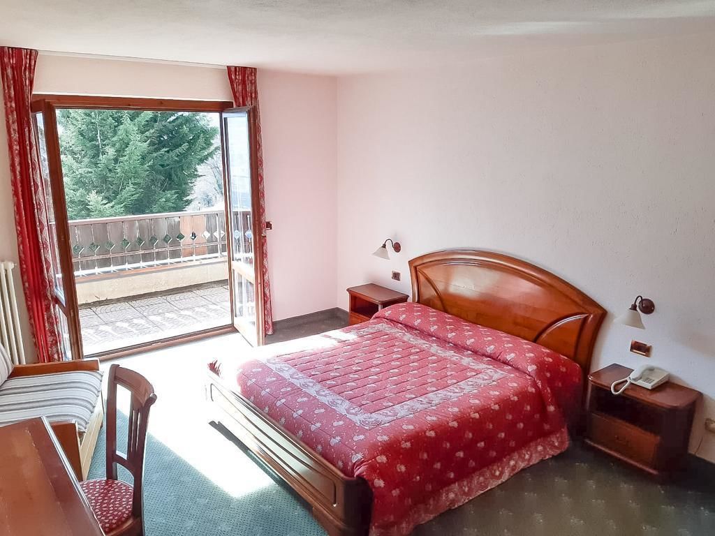 double or twin room, 1 double or 2 single beds, mountain view | select comfort beds, individually furnished, desk, cots/infant beds