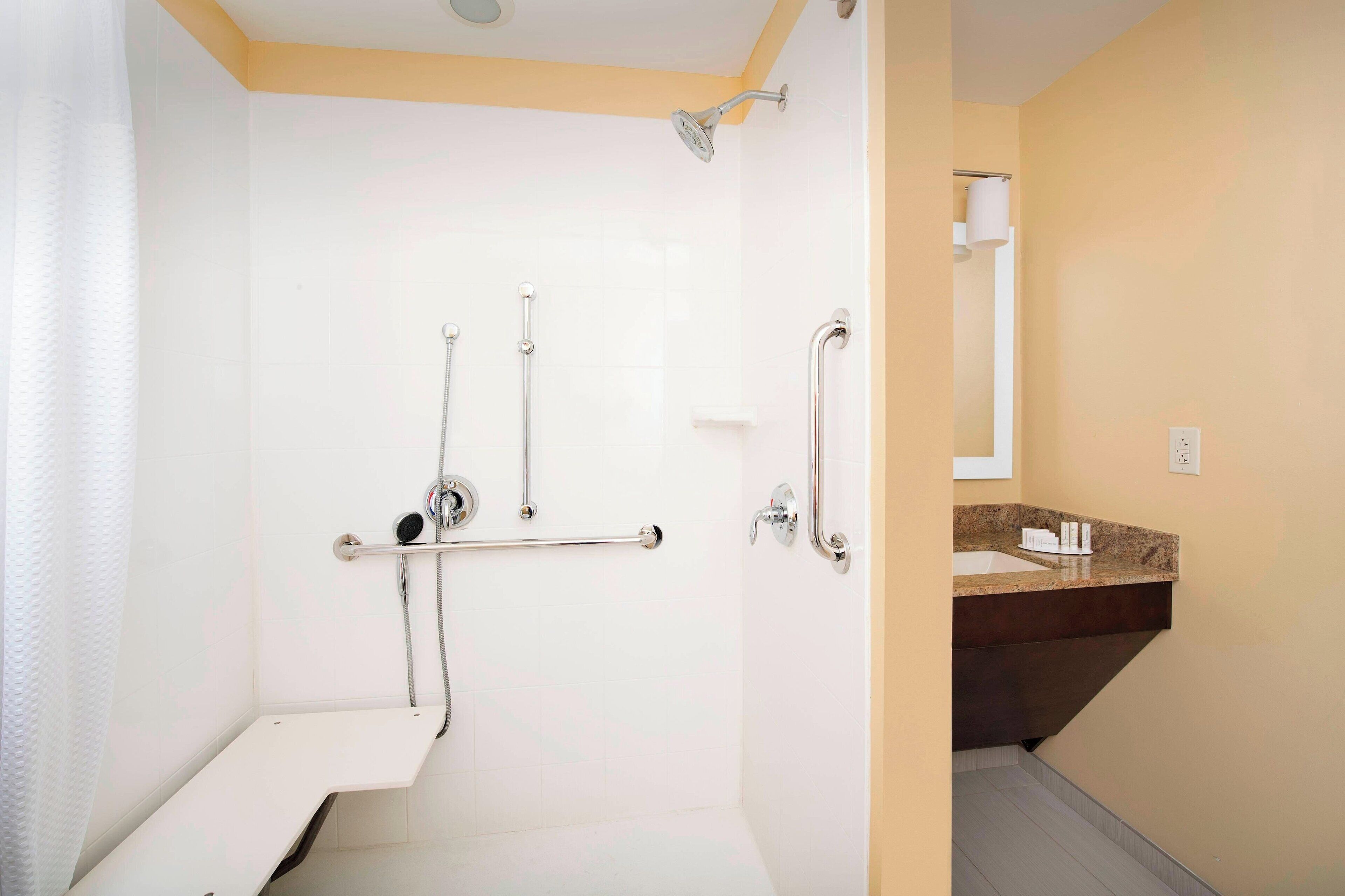 combined shower/bathtub, free toiletries, hair dryer, towels