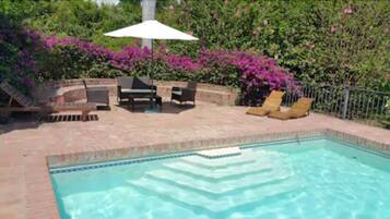 Outdoor pool, pool umbrellas, pool loungers