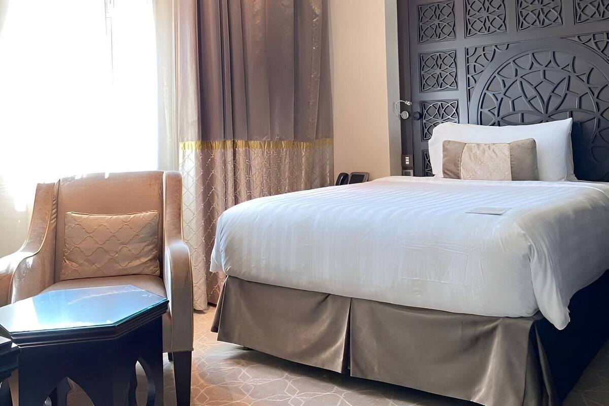 Egyptian cotton sheets, down comforters, memory foam beds, minibar