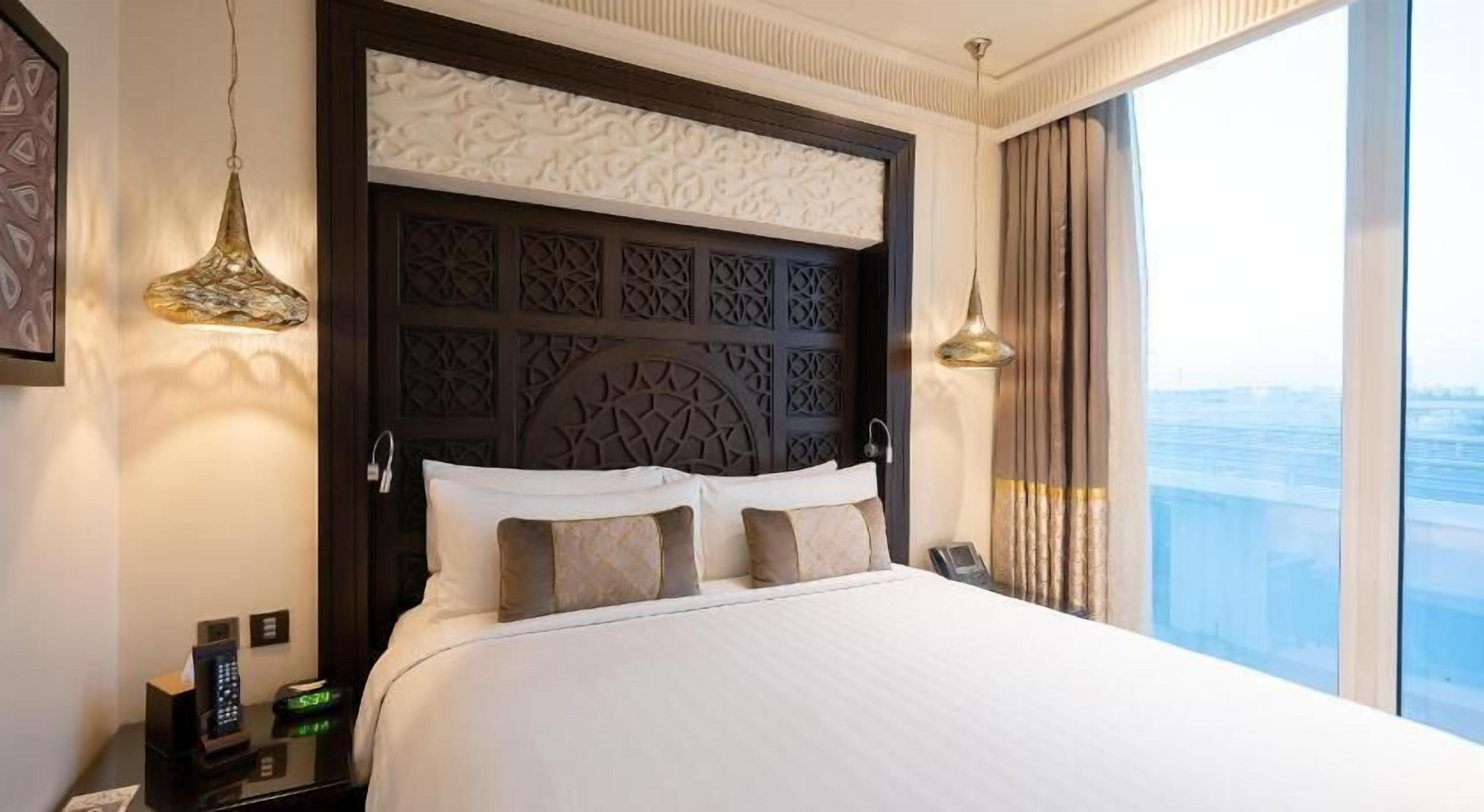 Egyptian cotton sheets, down comforters, memory foam beds, minibar