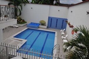 Outdoor pool, sun loungers