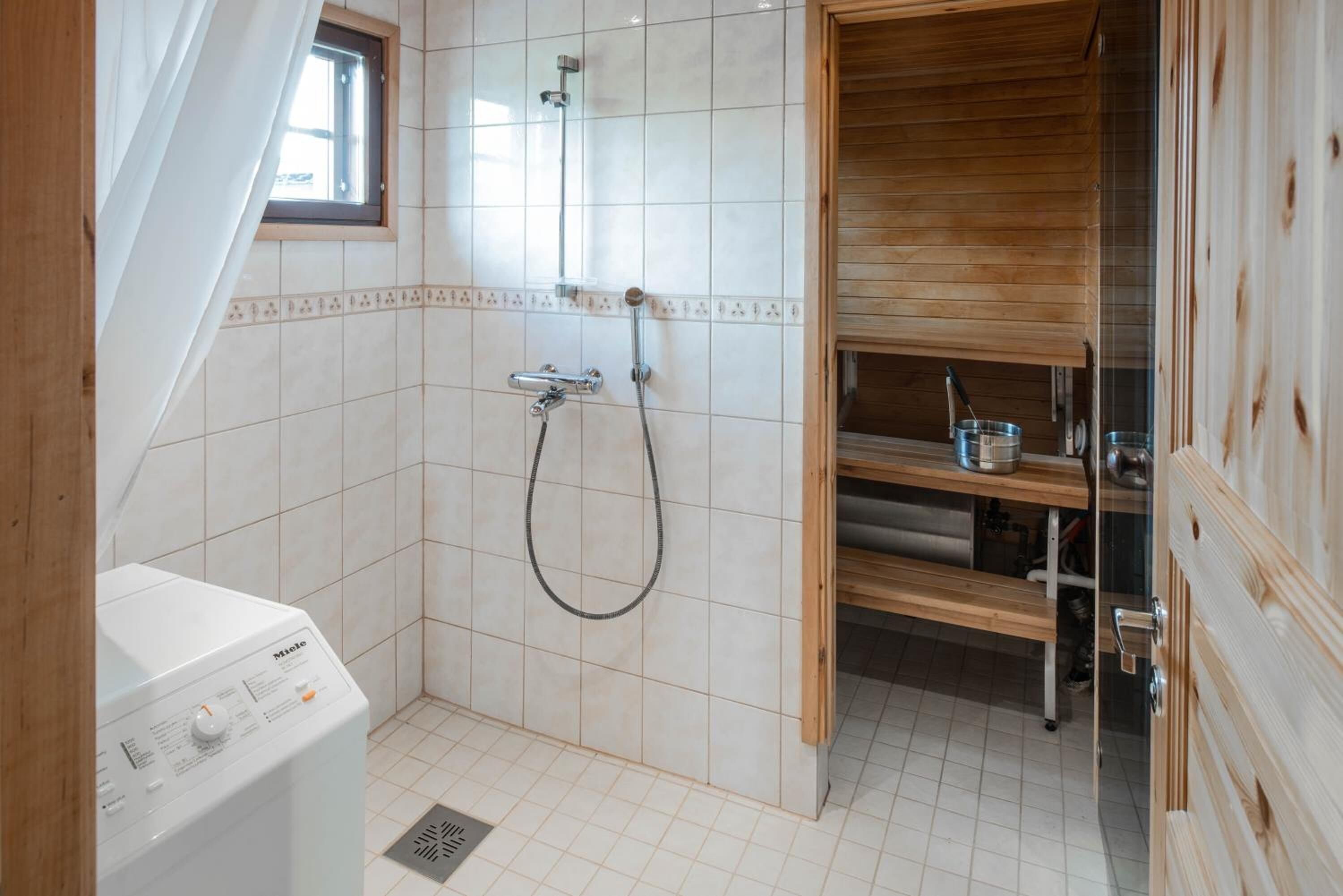 shower, hair dryer, heated floors, towels