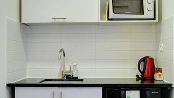 Fridge, microwave, stovetop, electric kettle