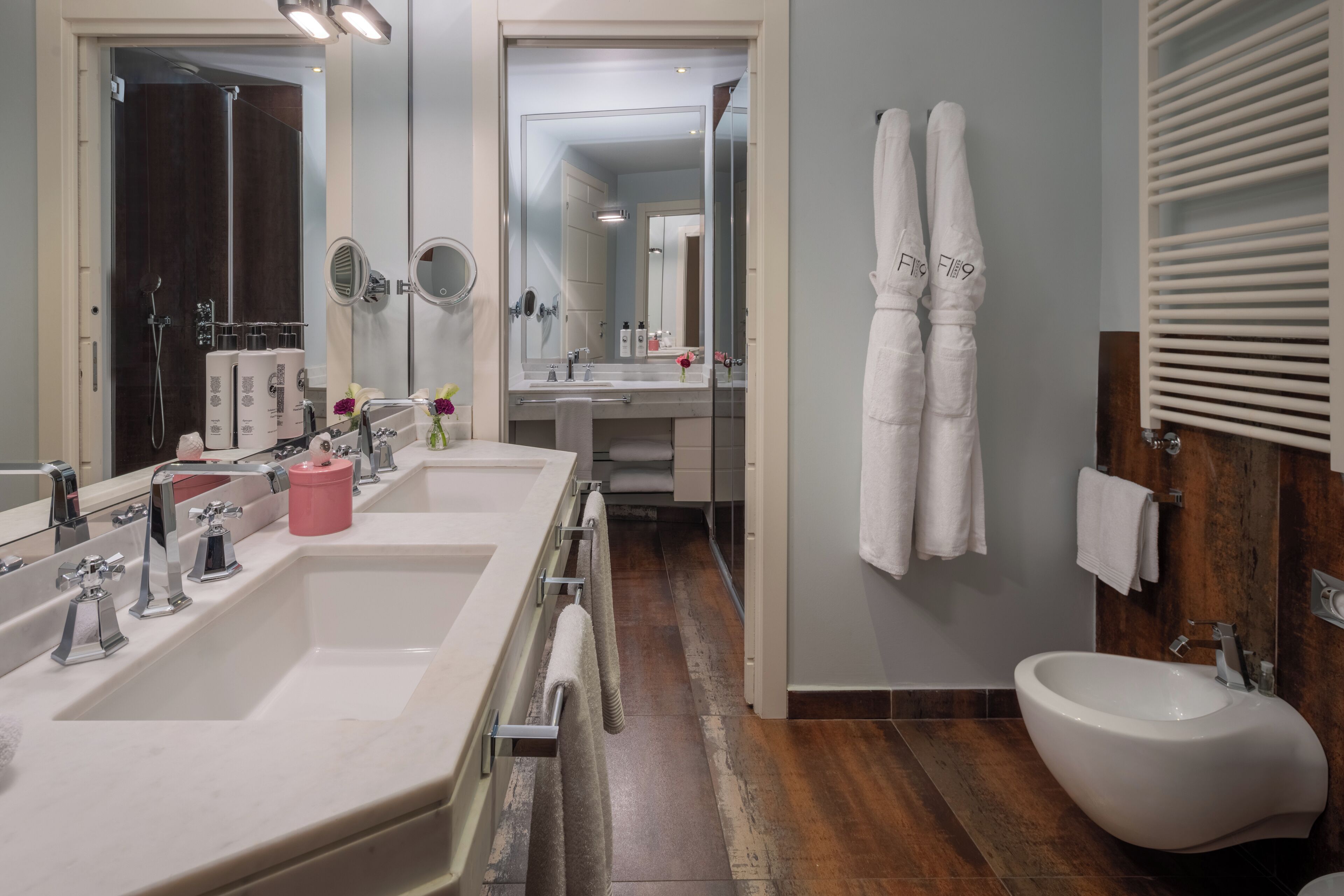 rainfall showerhead, designer toiletries, hair dryer, bathrobes