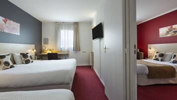 Family Triple Room, 1 Double Bed | Individually furnished, desk, blackout drapes, soundproofing