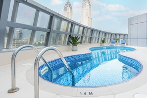 Outdoor pool, sun loungers