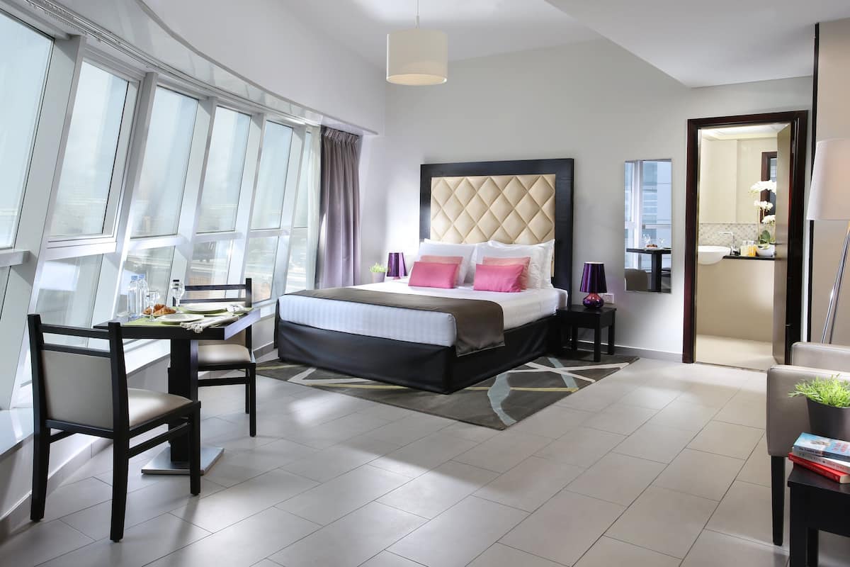 Executive Studio | 1 bedroom, premium bedding, in-room safe, blackout drapes