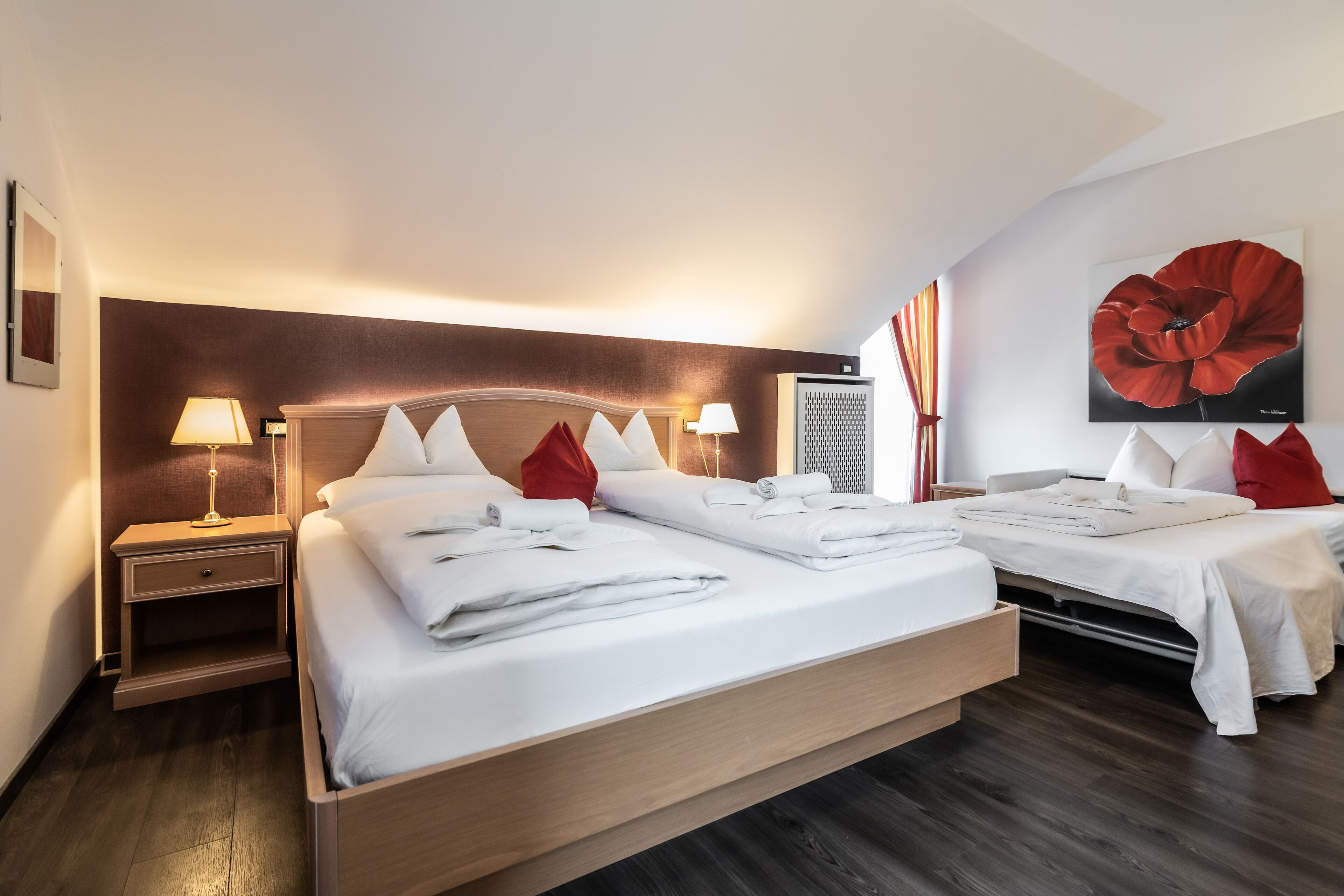 standard triple room, mountain view | in-room safe, individually decorated, individually furnished, desk