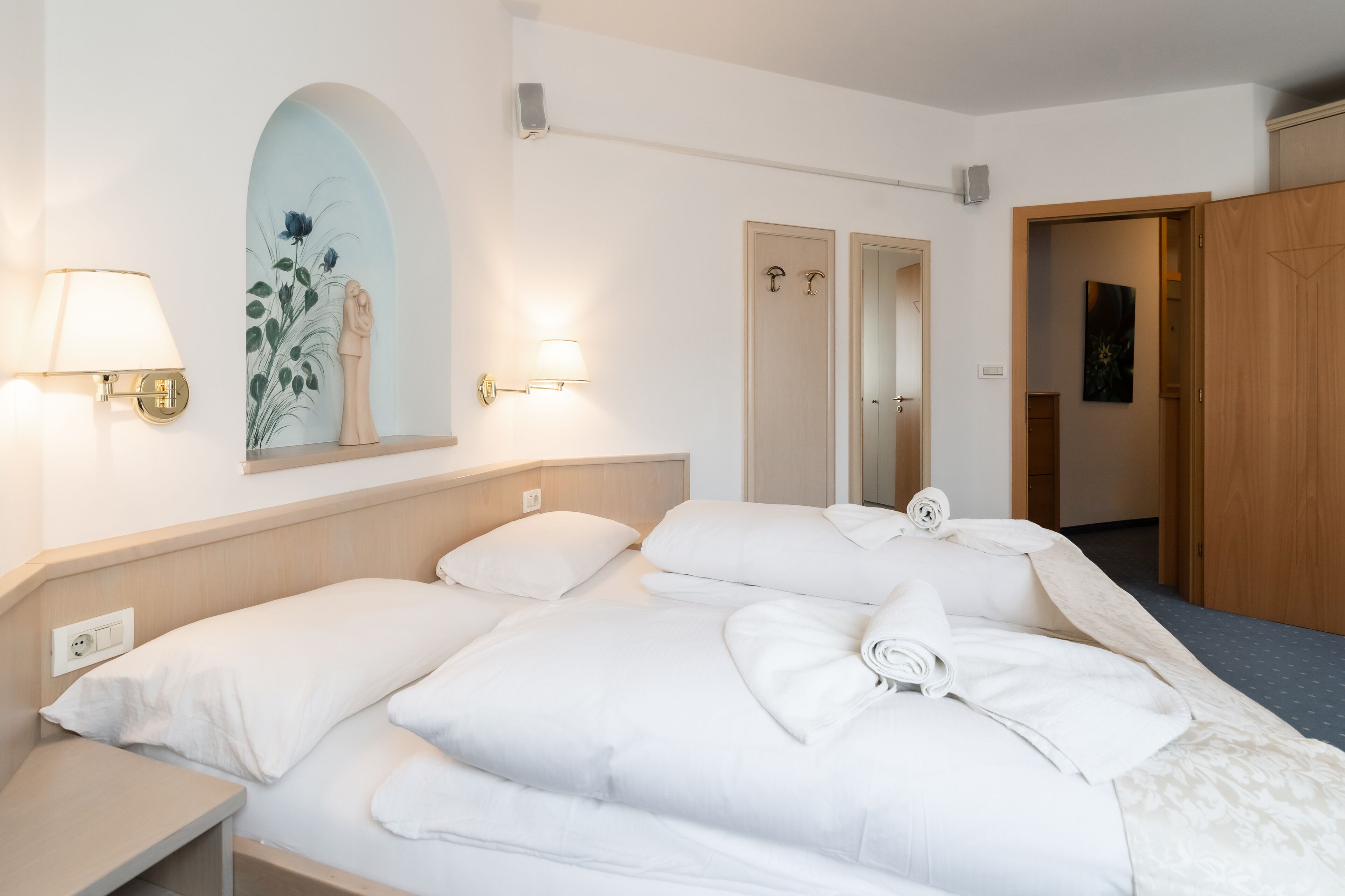 standard triple room, mountain view | in-room safe, individually decorated, individually furnished, desk