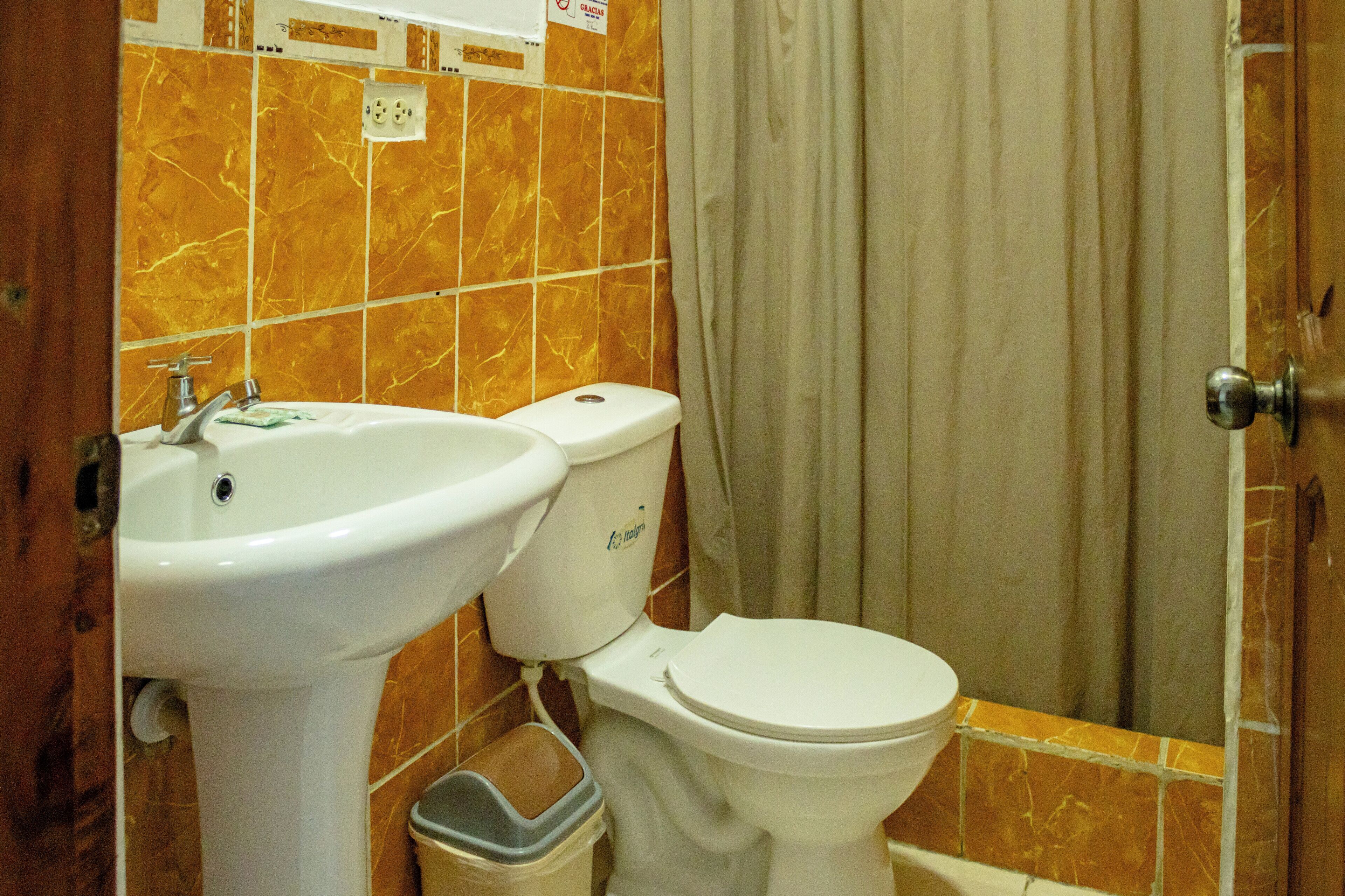 superior single room | bathroom | shower, towels, soap, toilet paper