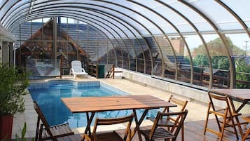 Indoor pool, outdoor pool, pool umbrellas, sun loungers