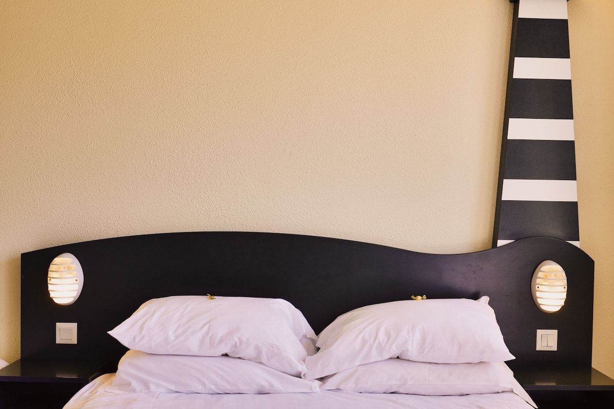 Standard Triple Room, Garden View | Desk, laptop workspace, blackout drapes, soundproofing