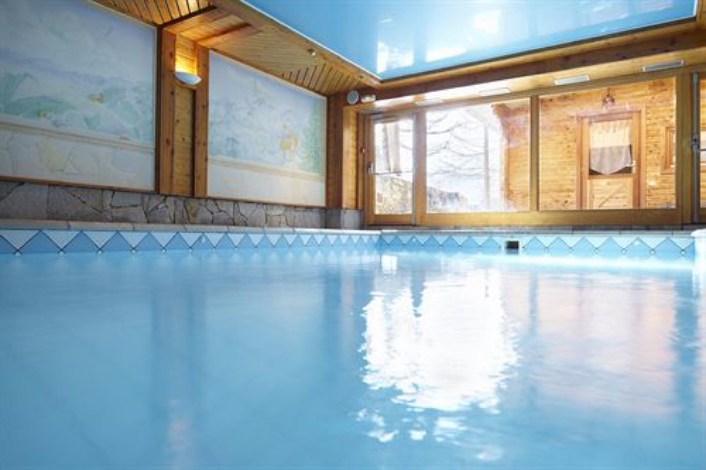 indoor pool, outdoor pool, pool loungers